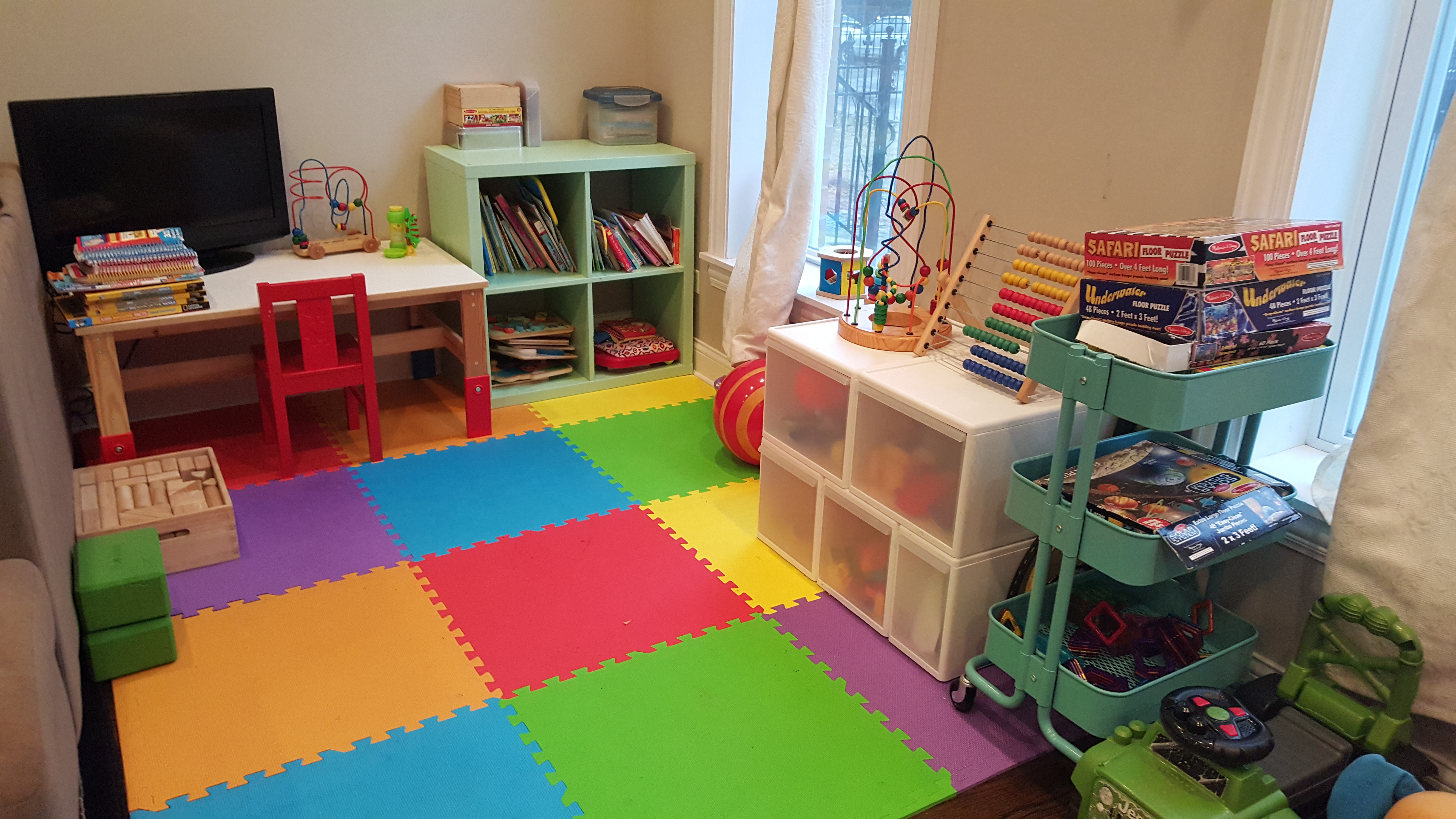 When it comes to my kids' play area,  I try to keep it small,  colorful and neat